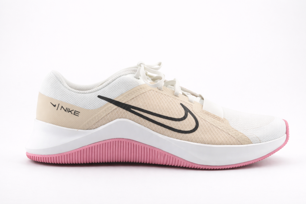 Nike women’s running shoe in white and pink